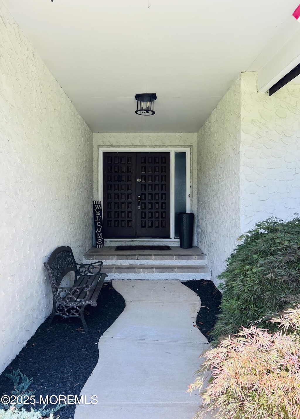 588 Midwood Dr, Brick, NJ 08724 - view of exterior entry featuring stucco siding