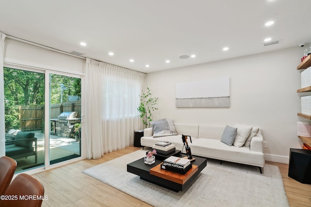 144 Colony Cir, Lakewood, NJ 08701 - living area with light wood-style flooring and recessed lighting