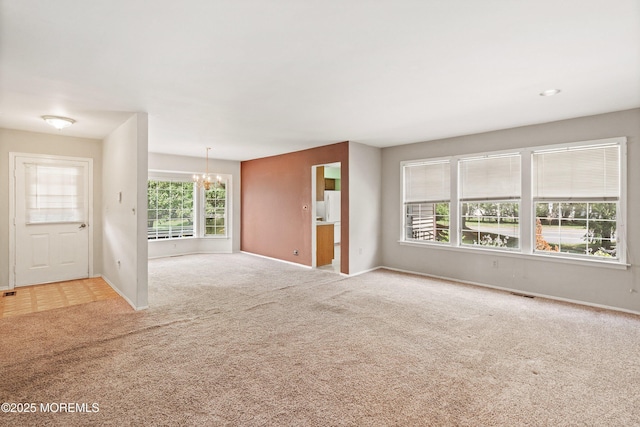 153D Concordia Cir, Monroe, NJ 08831 - unfurnished living room with carpet and a chandelier