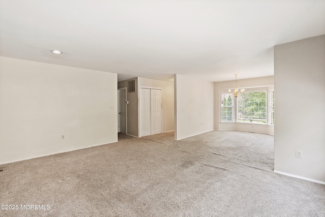 153D Concordia Cir, Monroe, NJ 08831 - carpeted empty room featuring a chandelier and recessed lighting
