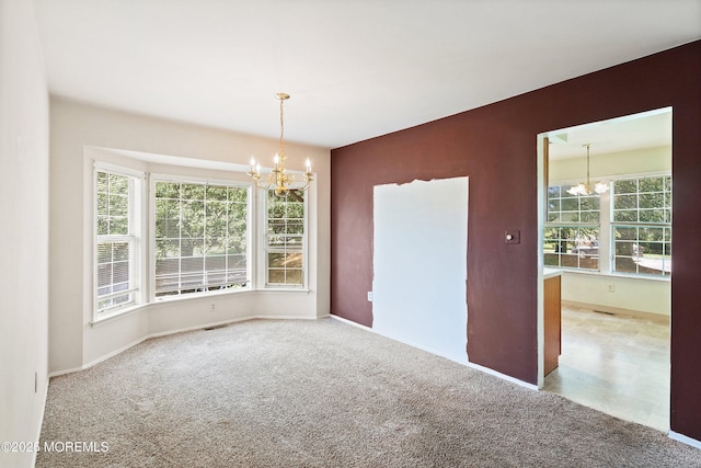 153D Concordia Cir, Monroe, NJ 08831 - carpeted empty room with a chandelier and healthy amount of natural light