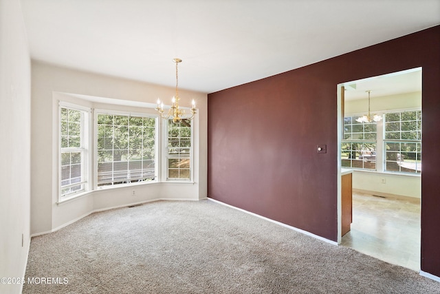 153D Concordia Cir, Monroe, NJ 08831 - spare room with a chandelier, healthy amount of natural light, and carpet