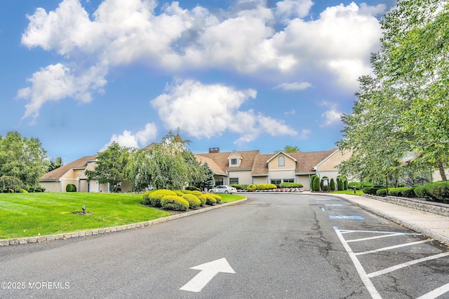 153D Concordia Cir, Monroe, NJ 08831 - view of asphalt road featuring curbs, sidewalks, and a residential view