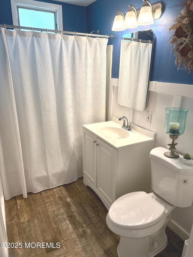 57 Albert Dr, Beach Haven West, NJ 08050 - full bath with vanity, wood finished floors, and a shower with shower curtain