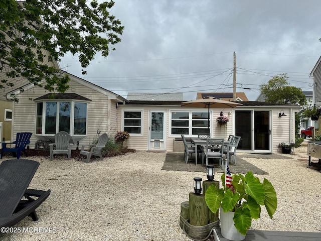 57 Albert Dr, Beach Haven West, NJ 08050 - back of property featuring a patio area