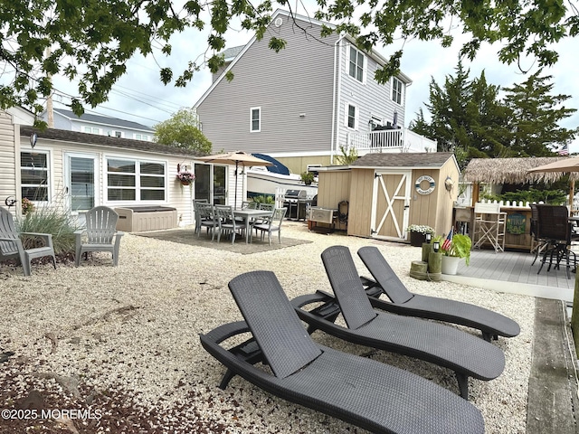 57 Albert Dr, Beach Haven West, NJ 08050 - back of house with a deck, outdoor dining space, and a storage unit