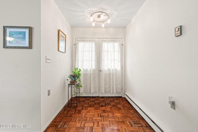 628A Stamford Ct, Manchester, NJ 08759 - doorway with baseboard heating and baseboards