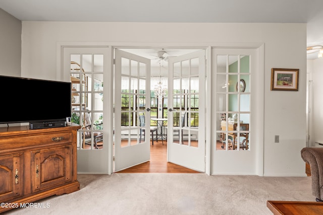 628A Stamford Ct, Manchester, NJ 08759 - doorway featuring french doors, light carpet, and a ceiling fan