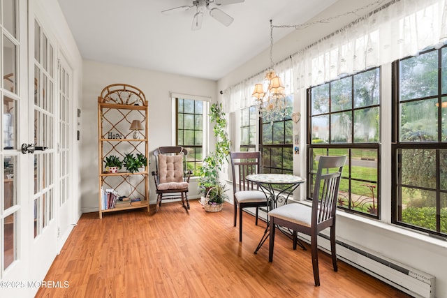 628A Stamford Ct, Manchester, NJ 08759 - sunroom / solarium with healthy amount of natural light, baseboard heating, a chandelier, and french doors