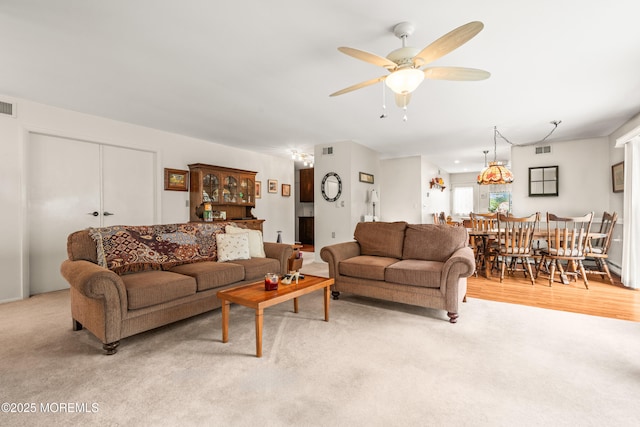 628A Stamford Ct, Manchester, NJ 08759 - living room featuring a ceiling fan and light colored carpet