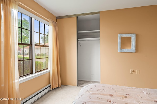 628A Stamford Ct, Manchester, NJ 08759 - bedroom with carpet flooring, baseboard heating, and a closet