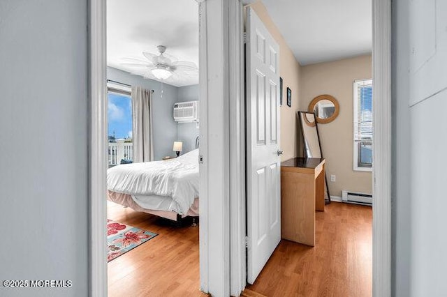 202 Lincoln Ave Unit C5, Seaside Heights, NJ 08751 - corridor with a baseboard radiator, wood finished floors, and an AC wall unit