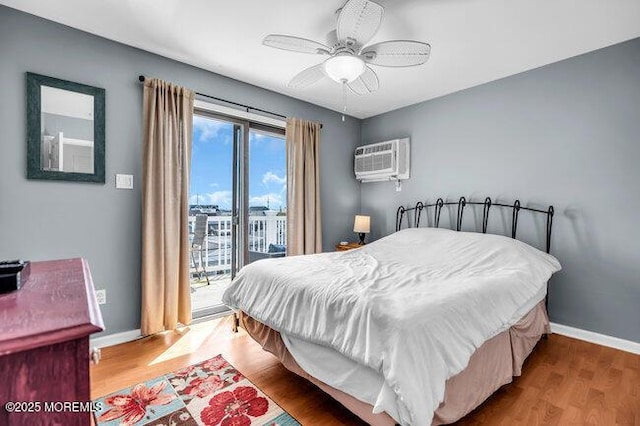 202 Lincoln Ave Unit C5, Seaside Heights, NJ 08751 - bedroom with access to outside, an AC wall unit, wood finished floors, and a ceiling fan