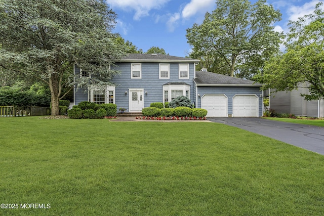16 Bridge Ct, Jackson, NJ 08527 - colonial-style house featuring an attached garage, driveway, and roof with shingles