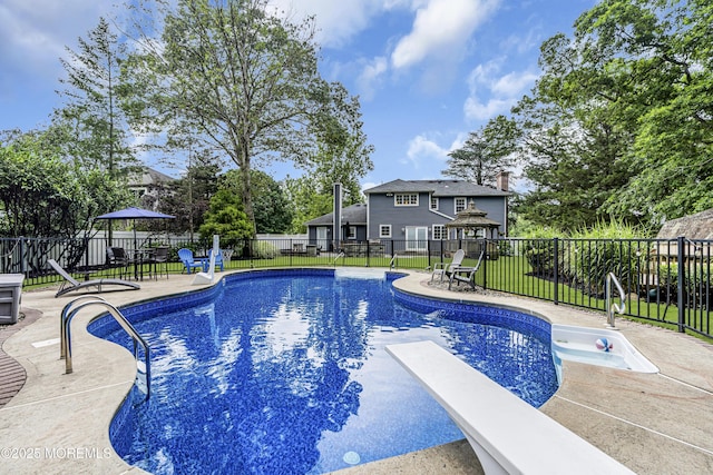 16 Bridge Ct, Jackson, NJ 08527 - view of swimming pool with a patio area, a fenced backyard, and a diving board