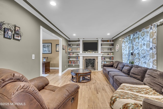 16 Bridge Ct, Jackson, NJ 08527 - living area with recessed lighting, crown molding, light wood-style floors, a fireplace with flush hearth, and built in shelves