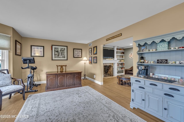 16 Bridge Ct, Jackson, NJ 08527 - bedroom with light wood-type flooring and a fireplace