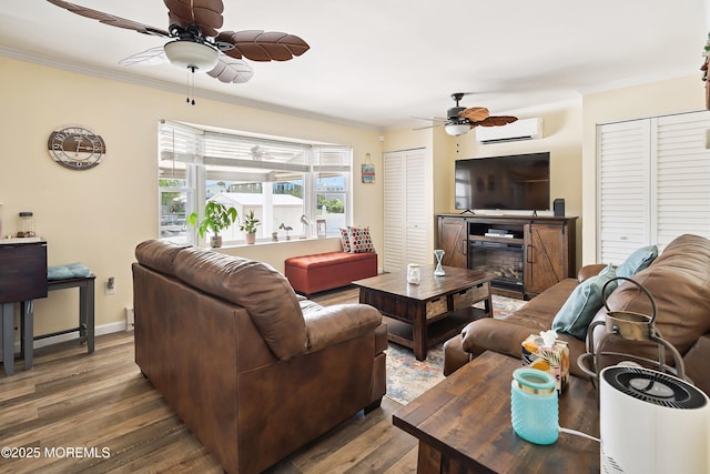 8 S Boston Dr, Little Egg Harbor, NJ 08087 - living area featuring a wall unit AC, a ceiling fan, crown molding, and wood finished floors
