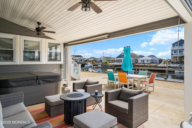 8 S Boston Dr, Little Egg Harbor, NJ 08087 - view of patio / terrace featuring a hot tub, outdoor dining space, a ceiling fan, a water view, and an outdoor living space