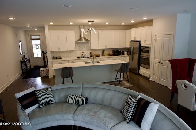 102 Pilot St, Marlboro, NJ 07746 - living room with dark wood finished floors and recessed lighting