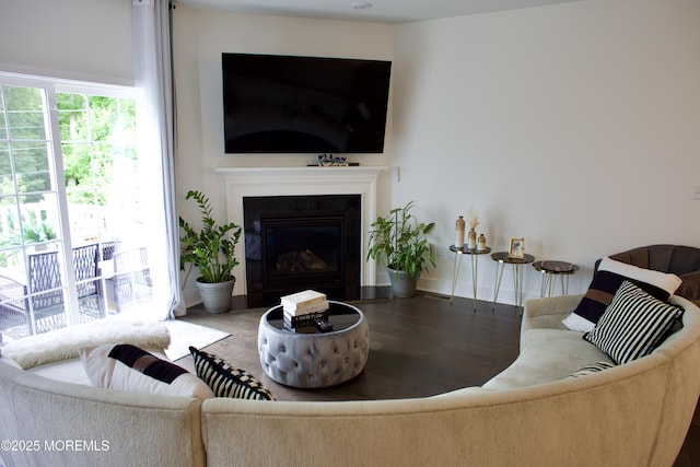 102 Pilot St, Marlboro, NJ 07746 - living area featuring wood finished floors and a glass covered fireplace