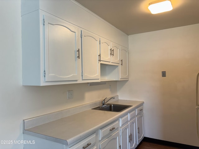 21 Yorkshire Ct Unit A, Manchester, NJ 08759 - kitchen with white cabinetry, light countertops, and dark wood-type flooring