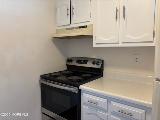 21 Yorkshire Ct Unit A, Manchester, NJ 08759 - kitchen featuring stainless steel range with electric cooktop, under cabinet range hood, white cabinetry, and light countertops
