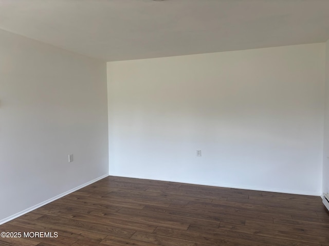 21 Yorkshire Ct Unit A, Manchester, NJ 08759 - spare room featuring dark wood-style flooring and baseboards