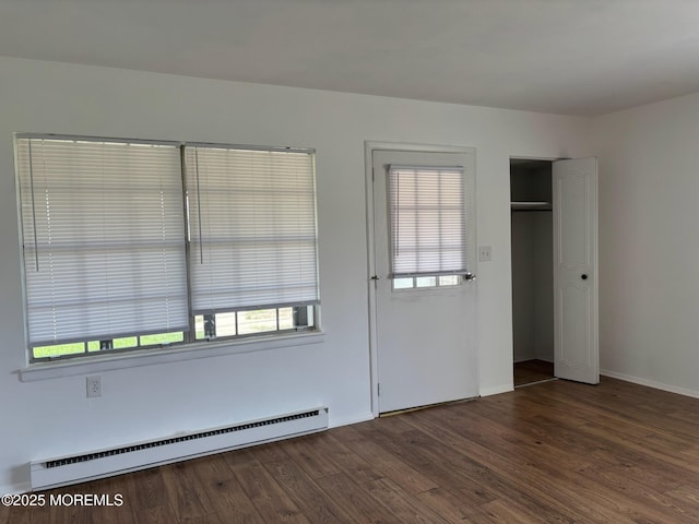 21 Yorkshire Ct Unit A, Manchester, NJ 08759 - entrance foyer featuring a baseboard heating unit, wood finished floors, and healthy amount of natural light