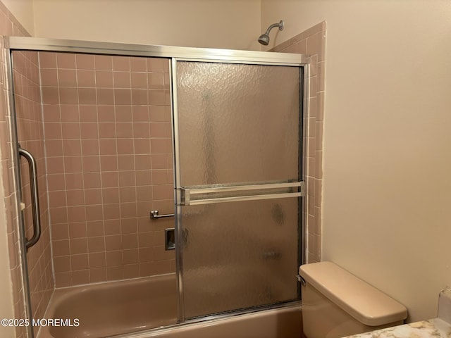 21 Yorkshire Ct Unit A, Manchester, NJ 08759 - bathroom featuring toilet and shower / bath combination with glass door