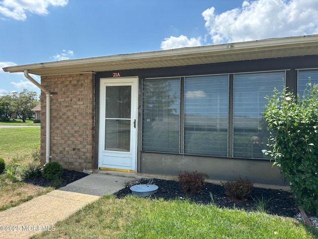 21 Yorkshire Ct Unit A, Manchester, NJ 08759 - doorway to property featuring brick siding