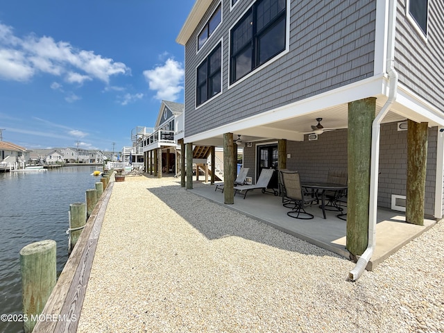 3365 Heron Ln, Lavallette, NJ 08735 - view of patio / terrace featuring a water view, stairway, a ceiling fan, and a dock