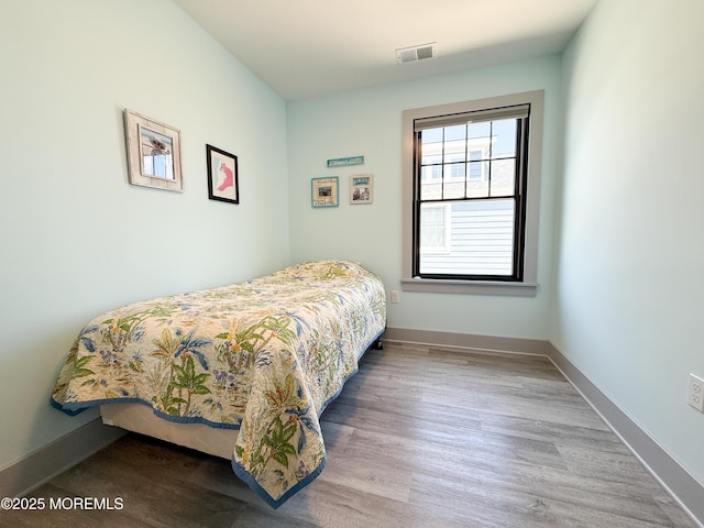 3365 Heron Ln, Lavallette, NJ 08735 - bedroom featuring wood finished floors and baseboards