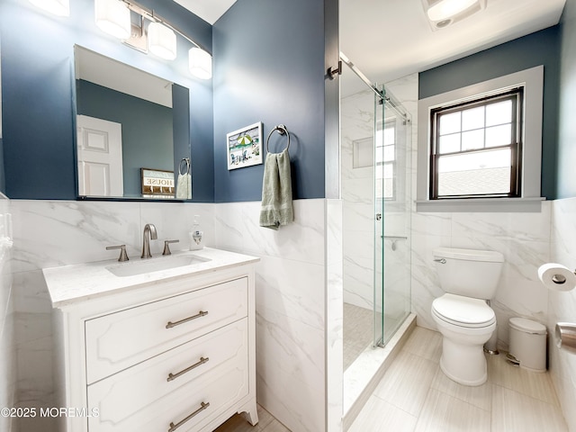 3365 Heron Ln, Lavallette, NJ 08735 - bathroom featuring tile walls, a marble finish shower, vanity, tile patterned floors, and a wainscoted wall