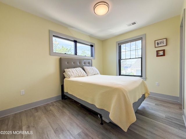 3365 Heron Ln, Lavallette, NJ 08735 - bedroom with wood finished floors and multiple windows