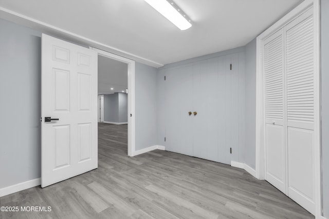 292 Washington Rd, Sayreville, NJ 08872 - unfurnished bedroom featuring light wood-style floors and a closet