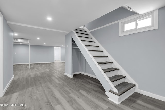 292 Washington Rd, Sayreville, NJ 08872 - below grade area featuring stairway, wood finished floors, and recessed lighting