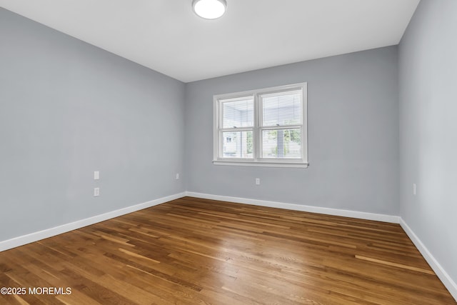 292 Washington Rd, Sayreville, NJ 08872 - empty room featuring wood finished floors and baseboards