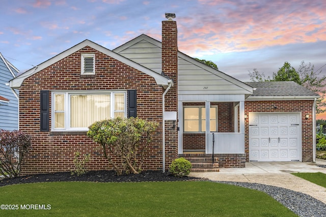 292 Washington Rd, Sayreville, NJ 08872 - view of front of home featuring an attached garage, brick siding, a chimney, and covered porch