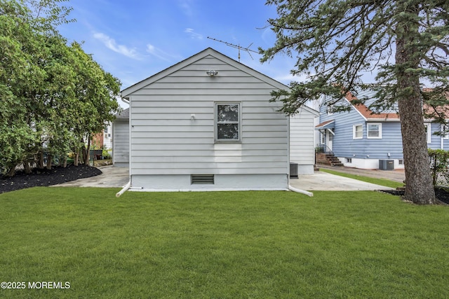 292 Washington Rd, Sayreville, NJ 08872 - rear view of house featuring a yard and a patio area