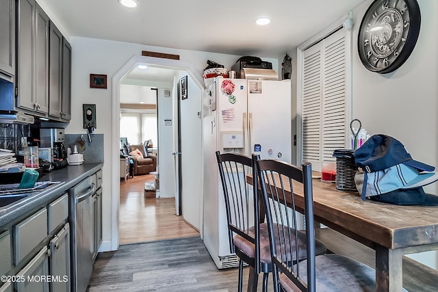 36 W Point Pleasant Ave, Ocean Gate, NJ 08740 - dining room featuring wood finished floors, recessed lighting, and arched walkways