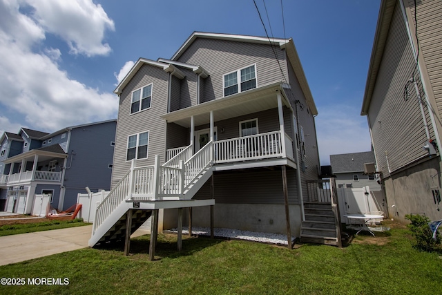 725 Prospect Ave, Union Beach, NJ 07735 - rear view of house with stairway, a porch, and a yard