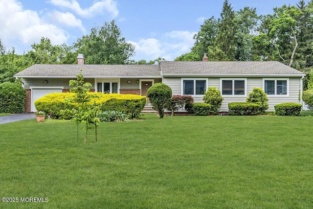 53 Edison Ave, Tinton Falls, NJ 07724 - ranch-style house featuring an attached garage, a front yard, a chimney, and driveway
