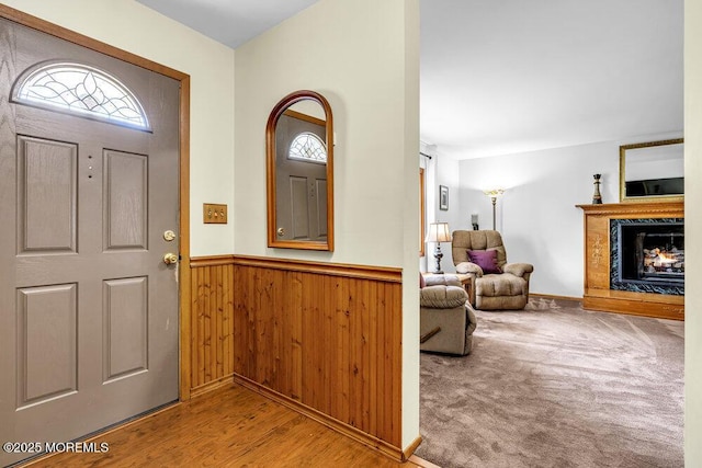 53 Edison Ave, Tinton Falls, NJ 07724 - entryway with wainscoting and a fireplace