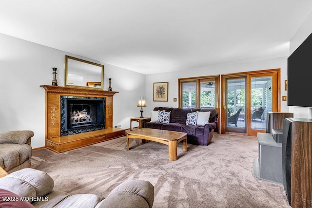 53 Edison Ave, Tinton Falls, NJ 07724 - living room with carpet and a fireplace with raised hearth