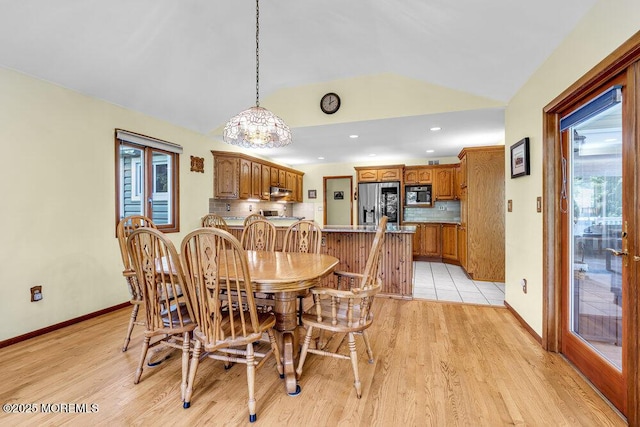 53 Edison Ave, Tinton Falls, NJ 07724 - dining space with vaulted ceiling, plenty of natural light, light wood-style floors, a chandelier, and recessed lighting