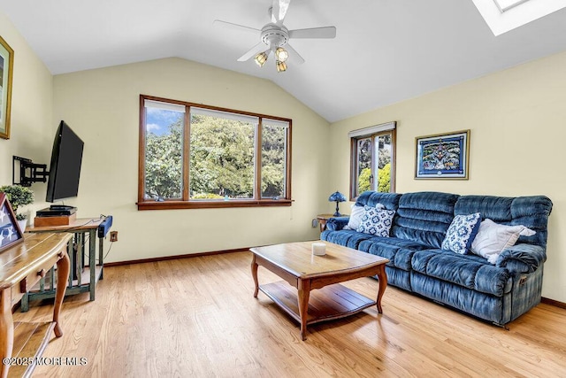 53 Edison Ave, Tinton Falls, NJ 07724 - living area with a skylight, ceiling fan, light wood-style floors, and lofted ceiling