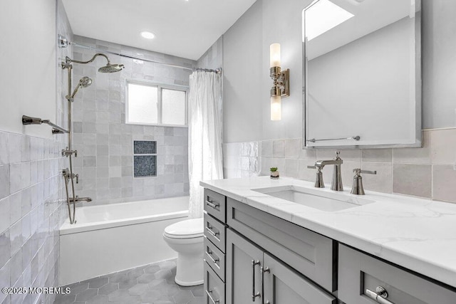 53 Edison Ave, Tinton Falls, NJ 07724 - full bath featuring vanity, tile walls, shower / tub combo with curtain, and tile patterned floors