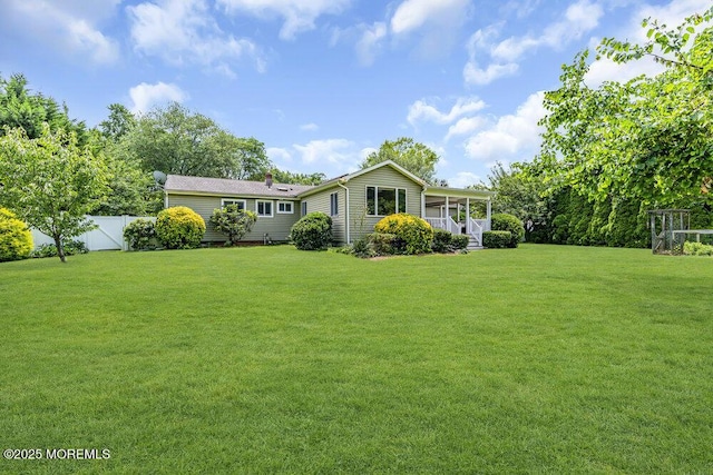 53 Edison Ave, Tinton Falls, NJ 07724 - rear view of house with a chimney