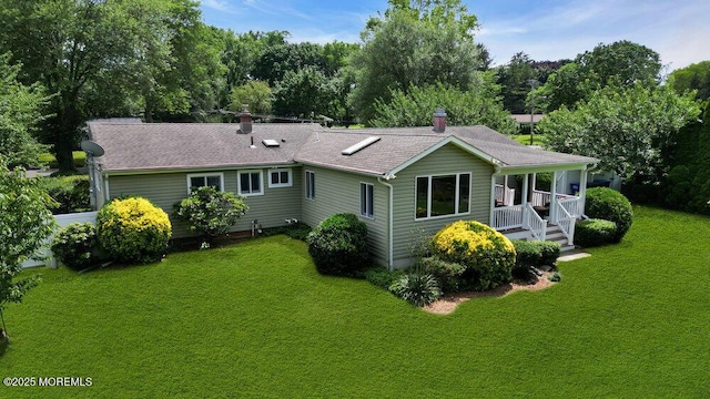 53 Edison Ave, Tinton Falls, NJ 07724 - view of property exterior with a lawn and covered porch
